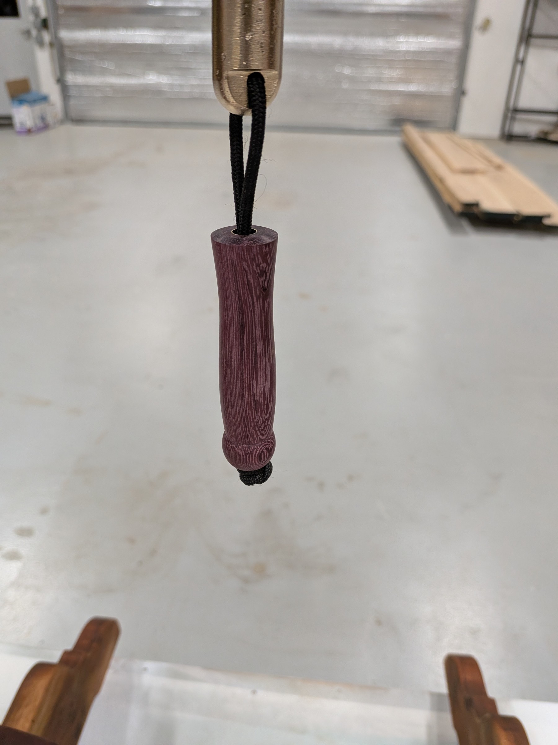 The handmade Purpleheart wood bell handle